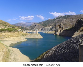 Canales reservoir, Guejar Sierra, province of Granada, Andalusia, Spain.  Is located in Genil riverberd and belong to the Confederacion Hidrografica del Guadalquivir.  - Shutterstock ID 1023234790