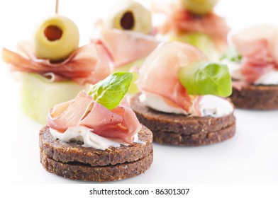Canapes With Ham And Pickled Olives
