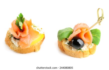 Canapes With Salmon And Herbs Isolated On White