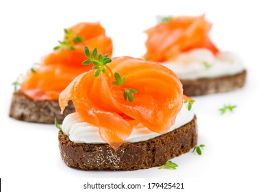 Canapes With Salmon Isolated On White Background
