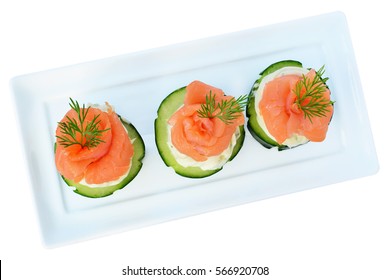 Canapes With Smoked Salmon, Cream Cheese And Cucumber On White Plate Isolated On White Background, Ketogenic Low-carb Diet Food Overhead View