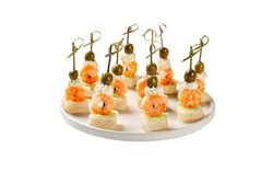 Canapes Wish Salmon, Olives And White Bread On Plate.