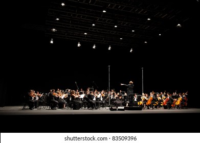 CANARY ISLANDS – AUGUST: 03: Conductor Michael Zlabinger from US, onstage with Otto Edelmann Socity and Sinfonica de Las Palmas, during Festival of Music August 03, 2011 in Canary Islands, Spain