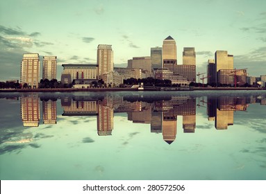 Canary Wharf business district in London at sunset. 