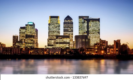 Canary Wharf at dusk, Famous skyscrapers of London's financial district at twilight.