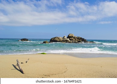 Canaveral Beach And Stones In The Sea.