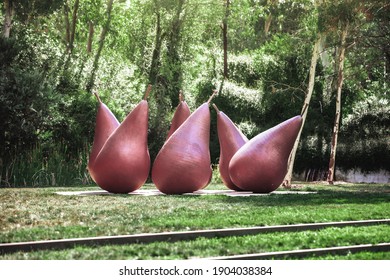 Canberra, ACT, Australia - January 16 2021 : giant pears sculpture in Canberra. Pear-version number 2 by George Baldessin.