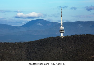 CANBERRA, AUSTRALIAN CAPITOL TERRITORY, AUSTRALIA - 03 APRIL 2019: The Telstra Tower, perched on top of Black Mountain serves as a communication tower and a popular tourist lookout over Canberra.