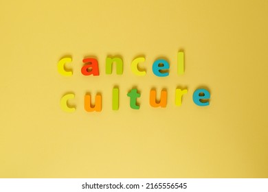 Cancel culture cancellation and social networks. Letters on a yellow background. Cancel a cultural symbol