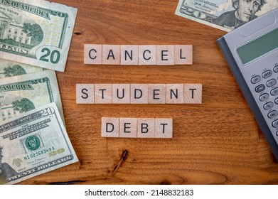Cancel student debt concept with american dollars.