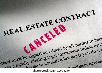 Canceled stamp red ink imprint on a Realtor real estate home sale contract (fictitious document with authentic legal language)