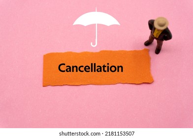 Cancellation.The word is written on a slip of colored paper. Insurance terms, health care words, Life insurance terminology. business Buzzwords.