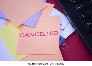 Cancelled. Text On Adhesive Note Paper. Event, Celebration Reminder Message.