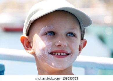 Cancer Child With Sun Cream On Her Face