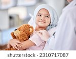Cancer patient, child and doctor with support, healthcare service and hand for empathy, love and healing in hospital bed. Happy, sick girl or kid listening to pediatrician or medical person helping