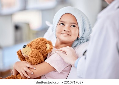 Cancer patient, child and doctor with support, healthcare service and hand for empathy, love and healing in hospital bed. Happy, sick girl or kid listening to pediatrician or medical person helping