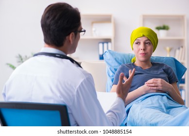 Cancer Patient Visiting Doctor For Medical Consultation In Clini