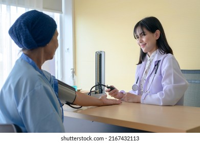 Cancer Patient Woman Wearing Head Scarf After Chemotherapy Consulting And Visiting Doctor In Hospital..	
