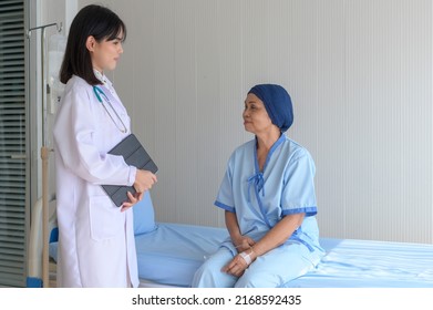 Cancer Patient Woman Wearing Head Scarf After Chemotherapy Consulting And Visiting Doctor In Hospital..	
