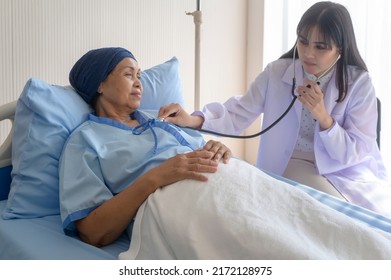 Cancer Patient Woman Wearing Head Scarf After Chemotherapy Consulting And Visiting Doctor In Hospital..	
