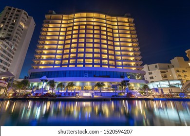 Cancun, Mexico - Aug 30, 2019 : Beach Palace Resort at Cancun beach during sunset