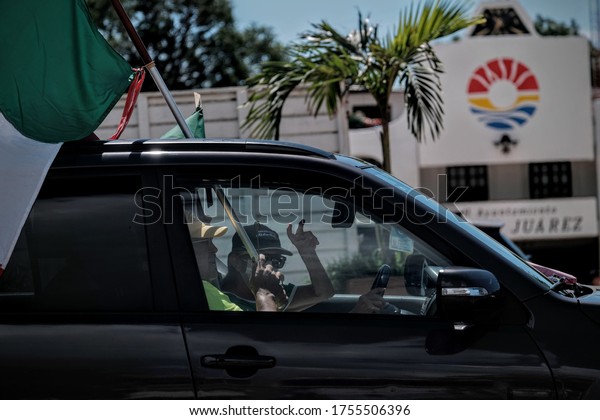 Cancun,\
Mexico June 13, 2020.- Activists aboard cars protest in the streets\
over the policies of Mexican President Andrés Manuel López Obrador\
and ask that he leave the country\'s\
presidency.