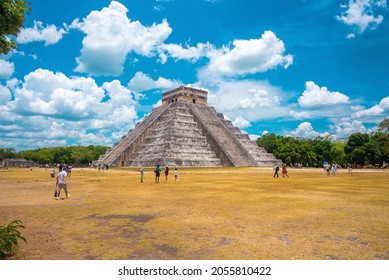 Cancun, Mexico. May 30, 2021. Tourists Admiring Ruins Of Temple Of Kukulkan, Pyramid In Chichen Itza. Historic Architectural Ruins Of Mayan