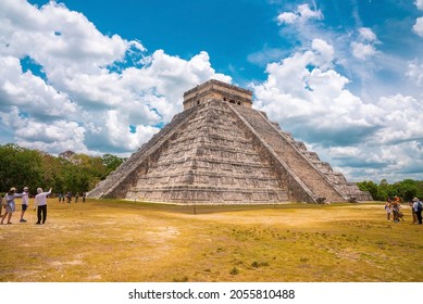 Cancun, Mexico. May 30, 2021. Tourists Admiring Ruins Of Temple Of Kukulkan, Pyramid In Chichen Itza. Historic Architectural Ruins Of Mayan