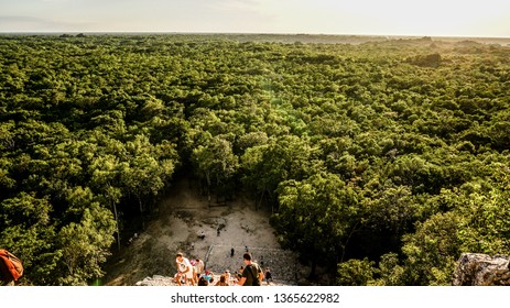 Cancun / Mexico - November 2014: Tourists Climbing The Ancient Coba Maya Ruin In The Thick Jungle Near Cancun, Yucatan, Mexico.