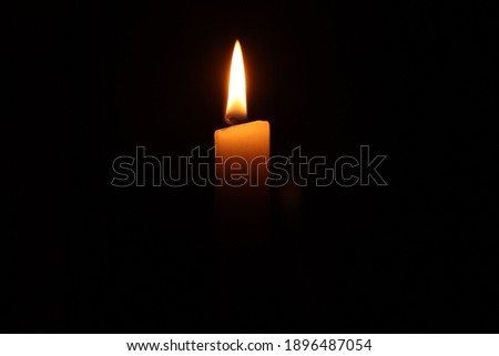 candel with black backround and a fire Stock photo © 