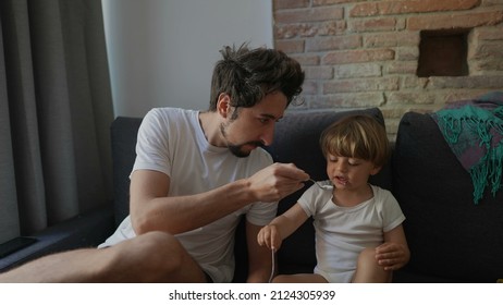 Candid Family Moment Father Feeds Toddler Child Yogurt Breakfast In Morning