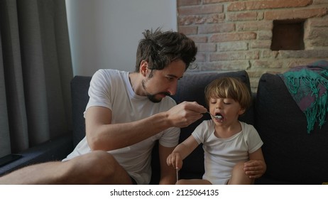 Candid Family Moment Father Feeds Toddler Child Yogurt Breakfast In Morning