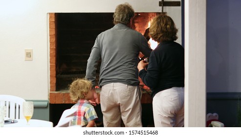 Candid Family Moment Grandpa Making Fire At Home