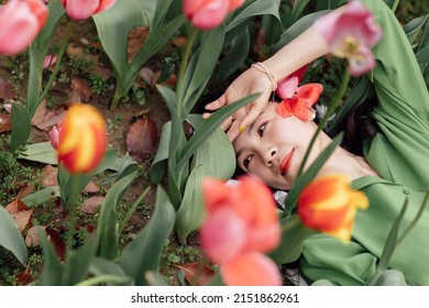 Candid Lifestyle Portrait Of Happy Young Beautiful Asian Sexy Woman Enjoying Life Outdoor In Park At Spring. Smiling Millennial Girl With Perfect Clear Glow Skin And Long Brunette Hair