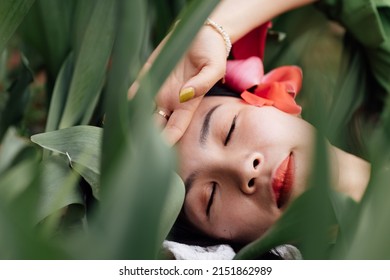 Candid Lifestyle Portrait Of Happy Young Beautiful Asian Sexy Woman Enjoying Life Outdoor In Park At Spring. Smiling Millennial Girl With Perfect Clear Glow Skin And Long Brunette Hair