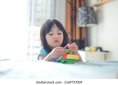 Candid Little Girl Playing Block Toy Stock Photo 1169737009 | Shutterstock