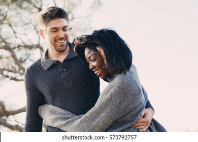 Candid Moment Of A Couple Enjoying Outdoors