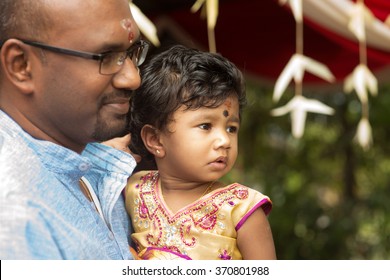 Candid Shoot Of Indian Father And Daughter In Blessing Ceremony. Traditional India Family Outdoor Portrait.