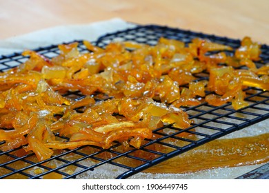 Candied Buddha’s Hand (Citrus medica var. sarcodactylis) or Fingered citron drying on a wire rack