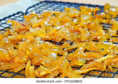 Candied Buddha’s Hand (Citrus medica var. sarcodactylis) or Fingered citron drying on a wire rack