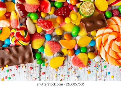 candies with jelly and sugar. colorful array of different childs sweets and treats