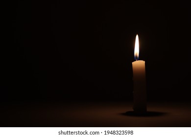 A Candle Burning Alone In A Dark Room -  Light Source On Dark Background - Candlelight Dark Background