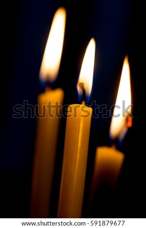 Similar – Many lighted candles in a church