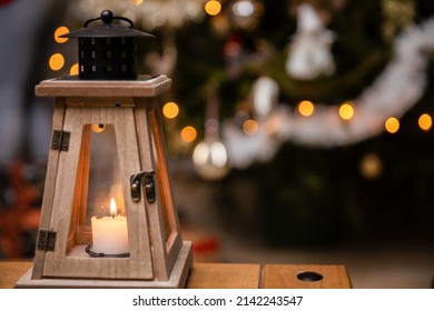 A Candle Burns Closed Inside A Decorative Lantern On Christmas Day.