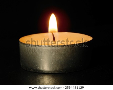 candle in the dark with flame