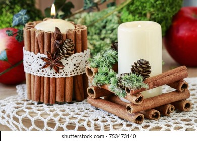 Candle Decorated With Cinnamon Sticks. Christmas Table Decoration. 