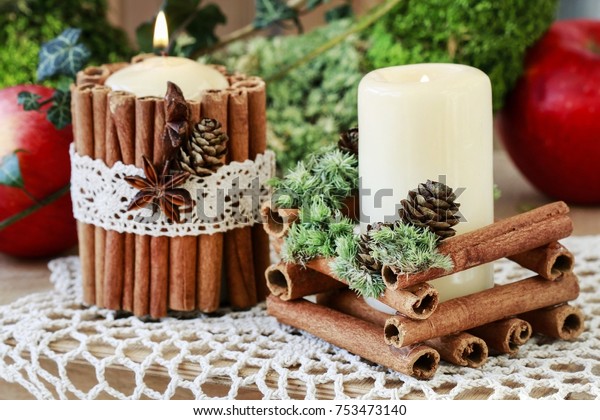 Candle Decorated Cinnamon Sticks Christmas Table Royalty Free