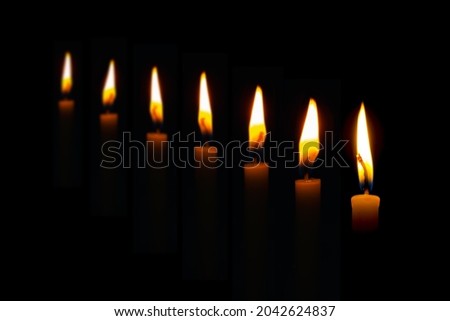 Similar – Many lighted candles in a church