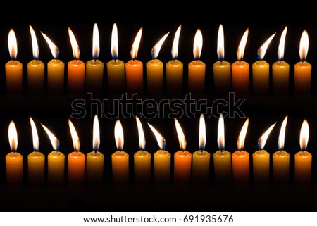 Similar – Many lighted candles in a church