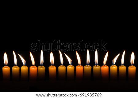 Similar – Many lighted candles in a church